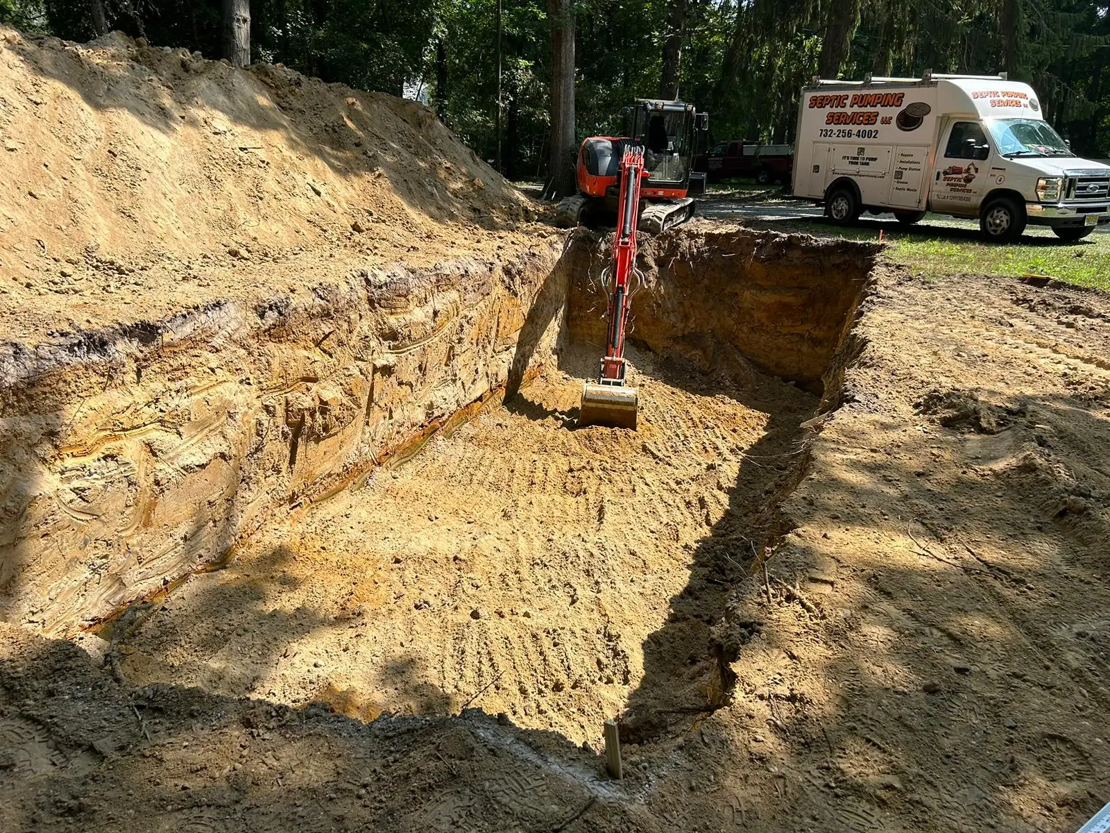 Technician inspecting septic system